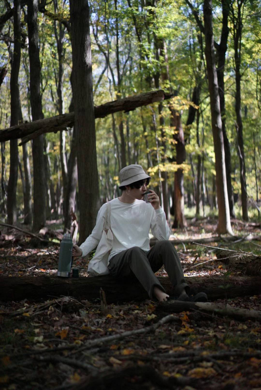 Eden Wu outdoors in a wooded landscape